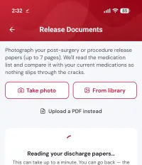 Release document upload screen offering take photo, choose from library or upload a PDF, with a message that it is reading your discharge papers
